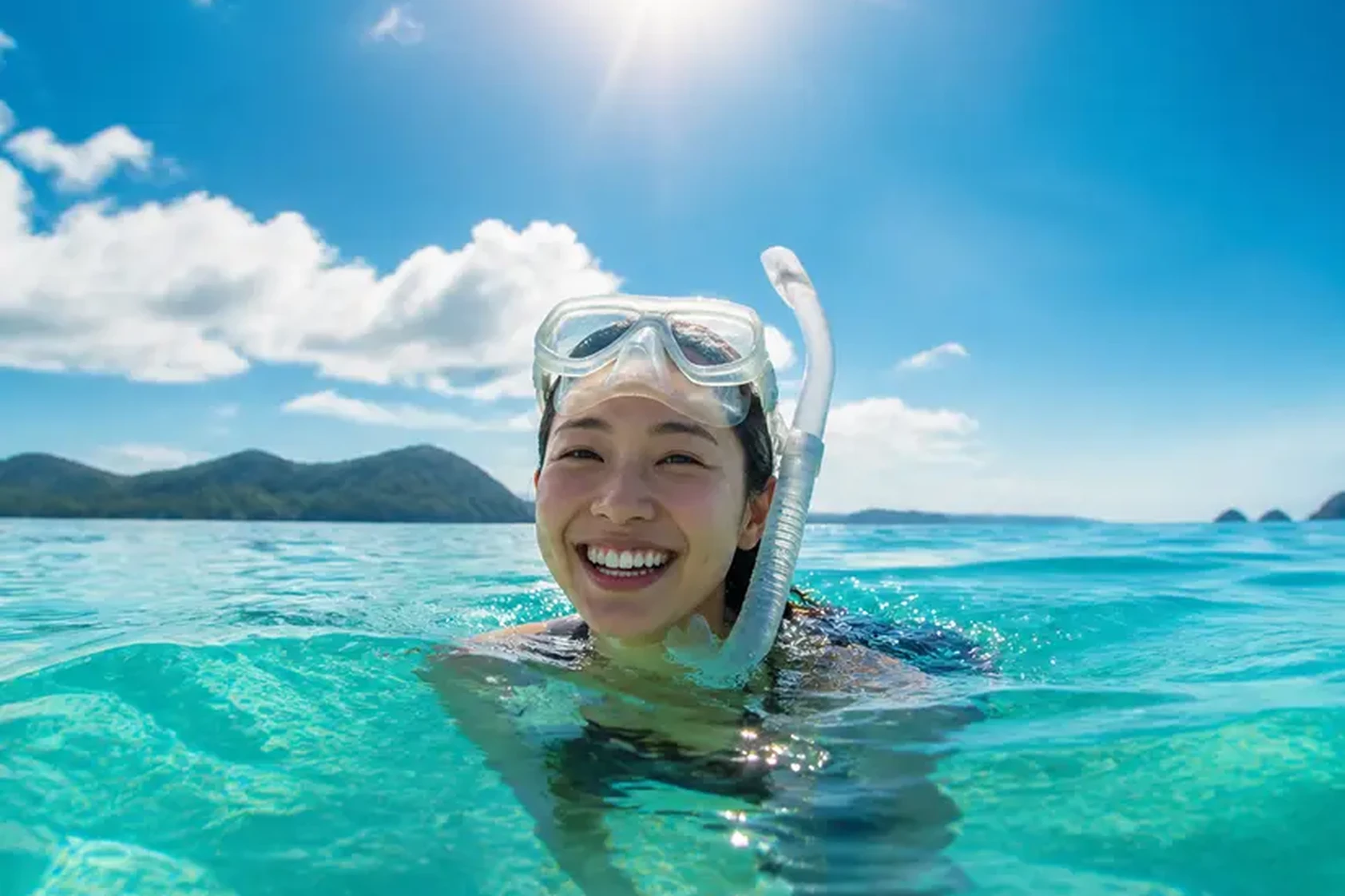 海から顔を出すダイバー